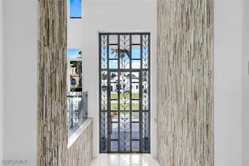 5 bedroom SingleFamilyResidence at 260 Channel Dr, Conners, Naples — photo 3