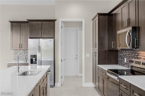 1438 NW 38th Pl, Cape Coral FL - photo 12 of 40