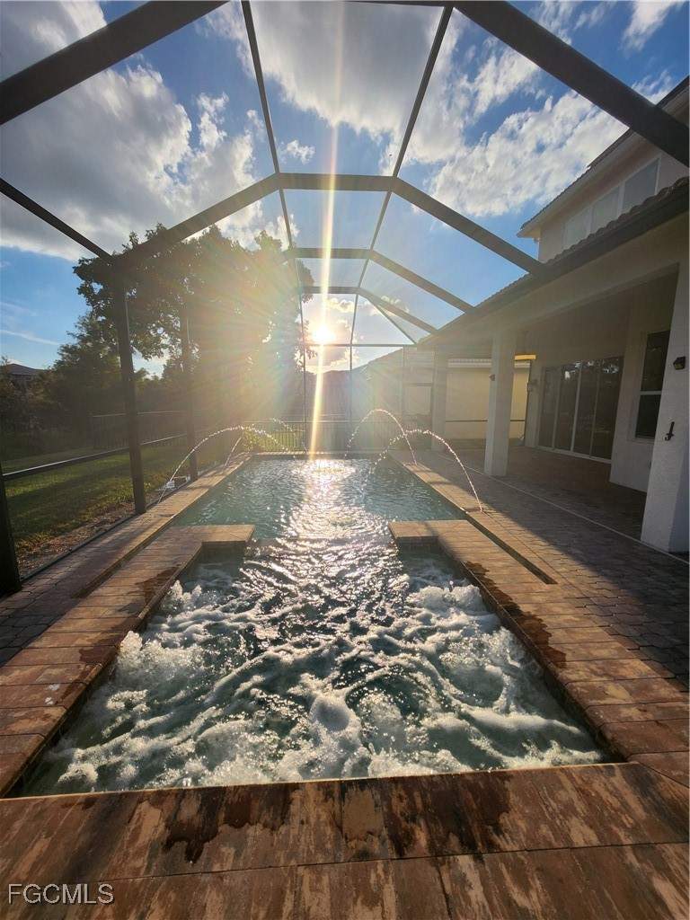 6 bedroom SingleFamilyResidence at 11079 Sparkleberry Dr S, Botanica Lakes, Fort Myers — photo 2