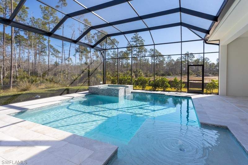 4 bedroom SingleFamilyResidence at 9535 Caymas Way N, Caymas, Naples — photo 2