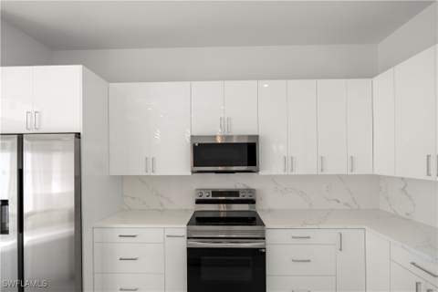 1027 Kirkwood St, Lehigh Acres FL - photo 8 of 50