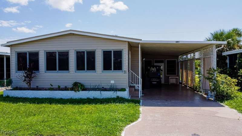 2 bedroom ManufacturedHome at 5506 Virginia Dare Ln, Old Bridge Village, North Fort Myers — photo 1
