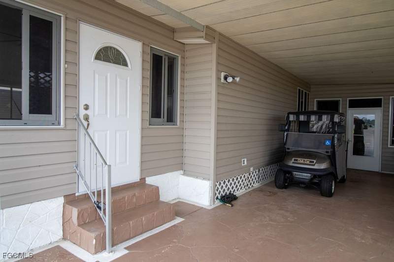 2 bedroom ManufacturedHome at 5506 Virginia Dare Ln, Old Bridge Village, North Fort Myers — photo 2