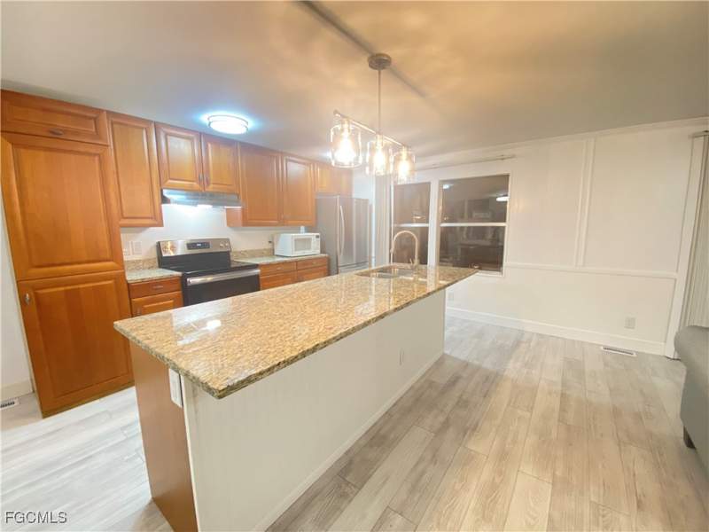 2 bedroom ManufacturedHome at 5506 Virginia Dare Ln, Old Bridge Village, North Fort Myers — photo 3