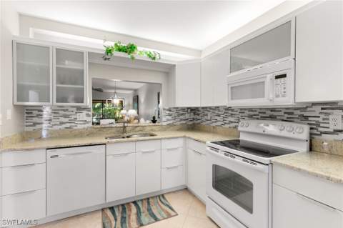 1828 Kings Lake Blvd 103, Naples FL - photo 14 of 31