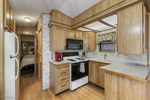 211 Sojourn Dr, North Fort Myers FL - photo 11 of 28