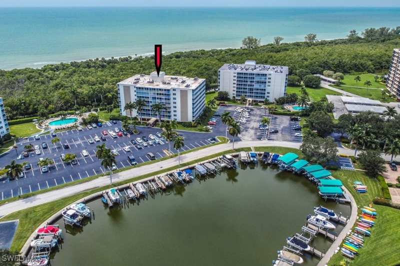 bedroom Condominium at 3 Bluebill Ave 405, Vanderbilt Towers, Naples — photo 1