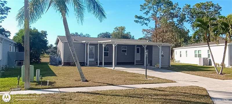2 bedroom ManufacturedHome at 133 Belle Isle Cir, Riviera Golf Estates, Naples — photo 1
