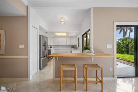 6760 Pelican Bay Blvd 312, Naples FL - photo 10 of 32