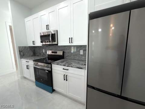 1008 Williams Ave, Lehigh Acres FL - photo 13 of 46