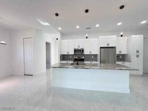 1008 Williams Ave, Lehigh Acres FL - photo 6 of 46
