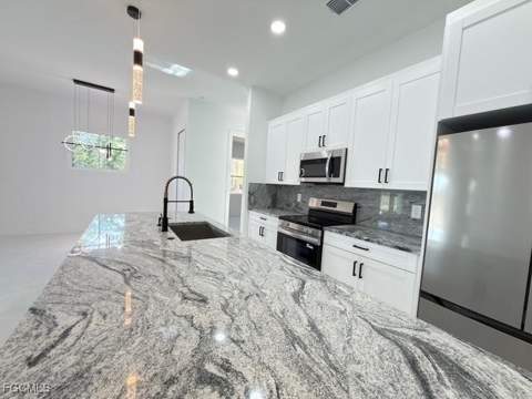 1008 Williams Ave, Lehigh Acres FL - photo 8 of 46