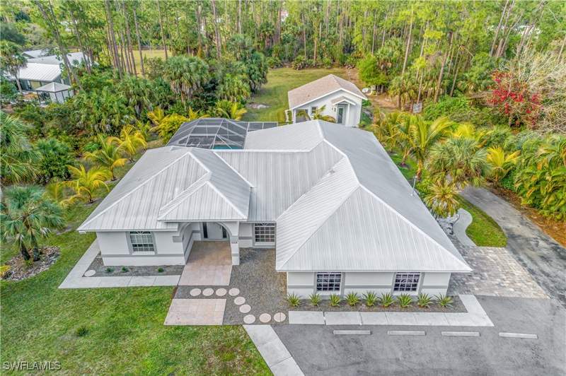 5 bedroom SingleFamilyResidence at 5099 Tallowood Way, Logan Woods, Naples — photo 2