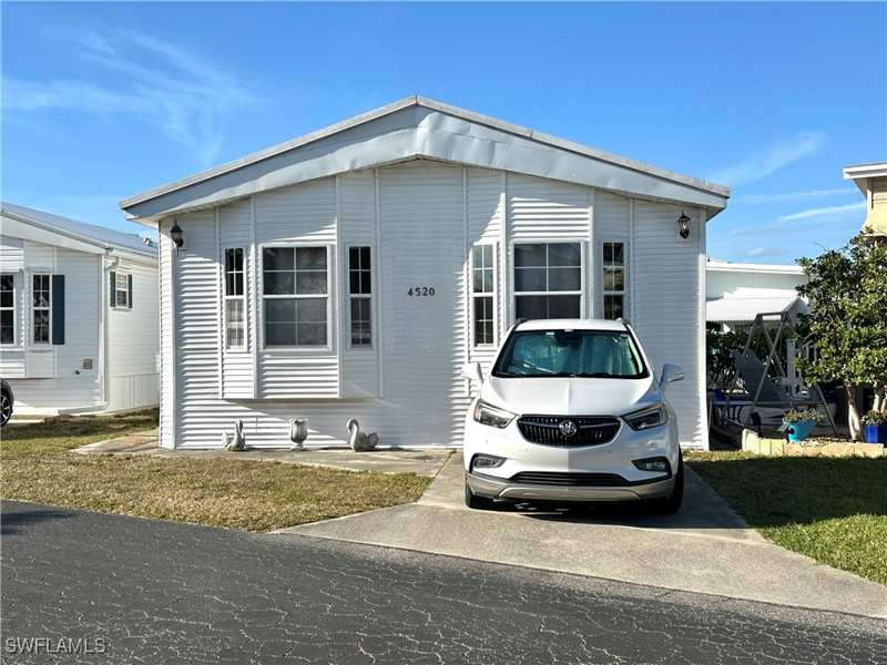 2 bedroom ManufacturedHome at 4520 Candlestick Ct E, Riverwoods Plantation, Estero — photo 1