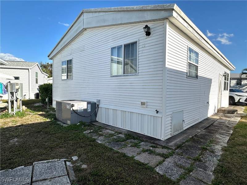 2 bedroom ManufacturedHome at 4520 Candlestick Ct E, Riverwoods Plantation, Estero — photo 3