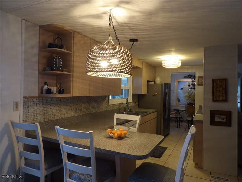 4 bedroom ManufacturedHome at 838 Hollyberry Ct, Forest Park Mobile Home, North Fort Myers — photo 3