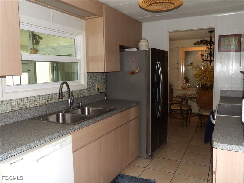 4 bedroom ManufacturedHome at 838 Hollyberry Ct, Forest Park Mobile Home, North Fort Myers — photo 4
