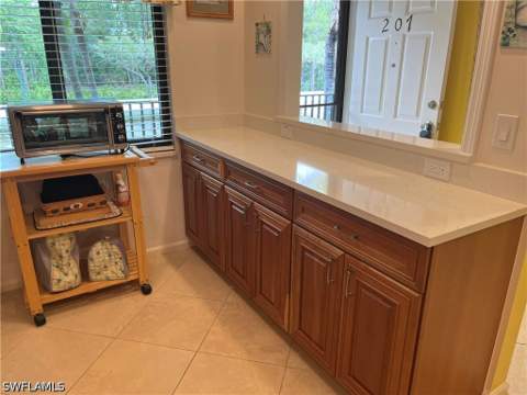 5792 Deauville Cir A207, Naples FL - photo 9 of 15