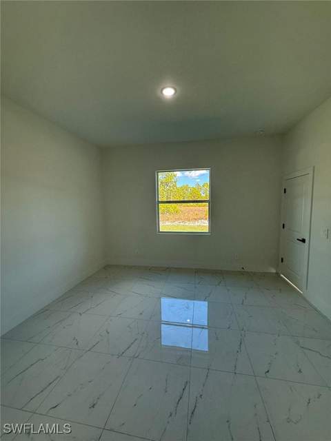 1121 Florence St E, Lehigh Acres FL - photo 23 of 31