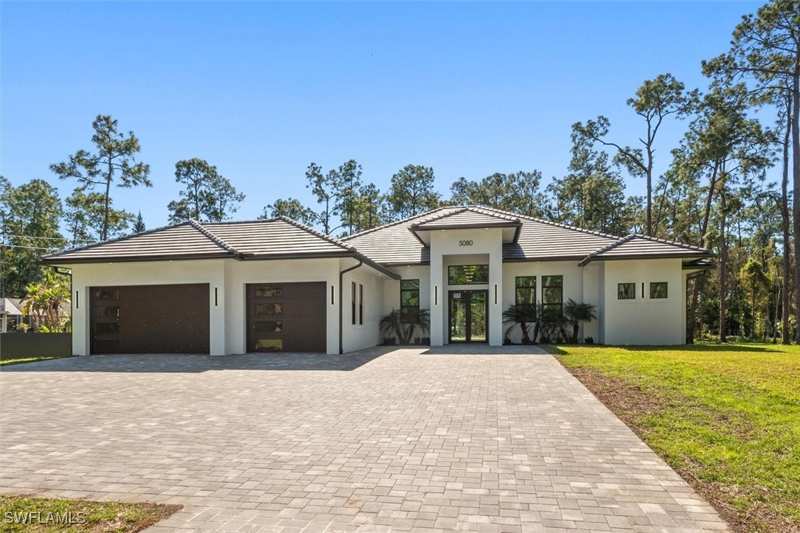 4 bedroom SingleFamilyResidence at 5080 Hickory Wood Dr, Logan Woods, Naples — photo 1