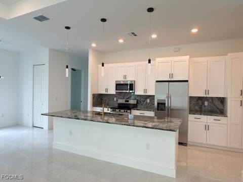 1504 W 9th St, Lehigh Acres FL - photo 8 of 45