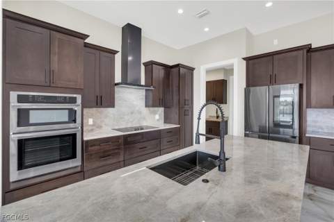 4114 NW 33rd Ln, Cape Coral FL - photo 11 of 50