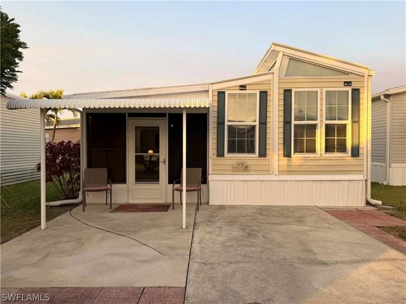 1 bedroom ManufacturedHome at 4710 Split Log Ln W, Riverwoods Plantation, Estero — photo 1