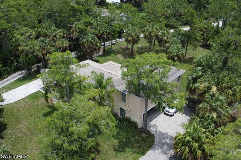 6 bedroom SingleFamilyResidence at 160 19th St SW, Golden Gate Estates, Naples — photo 1
