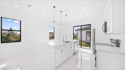 1143 Barfield St E, Lehigh Acres FL - photo 6 of 31