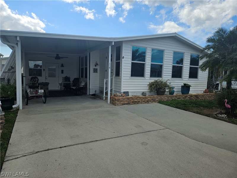 2 bedroom ManufacturedHome at 14 Peridot Ave 14PT, Enchanting Shores, Naples — photo 1