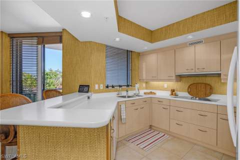 7225 Pelican Bay Blvd 402, Naples FL - photo 12 of 38