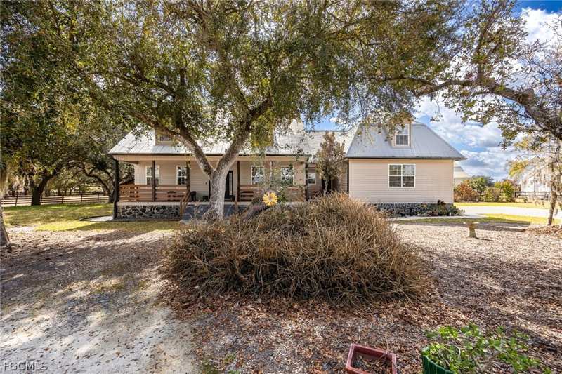 4 bedroom SingleFamilyResidence at 22800 N River Rd, Alva, Alva — photo 1