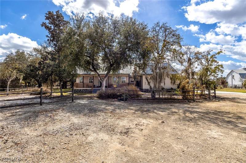 4 bedroom SingleFamilyResidence at 22800 N River Rd, Alva, Alva — photo 2