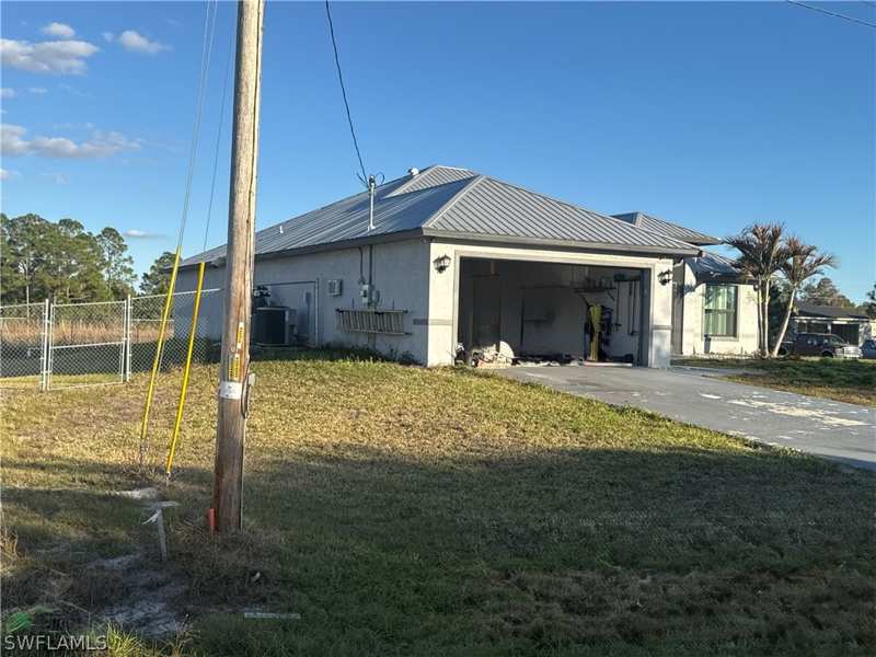 4 bedroom SingleFamilyResidence at 717 Fleming Ave S, Lehigh Acres, Lehigh Acres — photo 1
