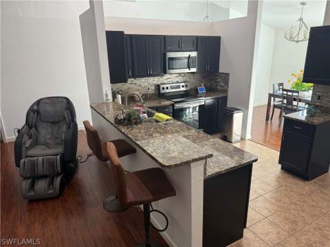 717 Fleming Ave S, Lehigh Acres FL - photo 10 of 32