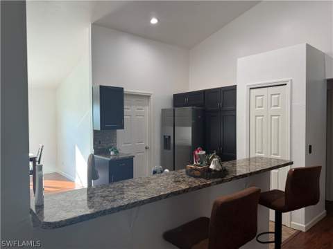 717 Fleming Ave S, Lehigh Acres FL - photo 11 of 32
