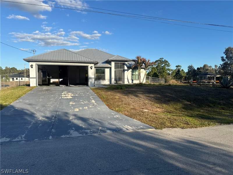 4 bedroom SingleFamilyResidence at 717 Fleming Ave S, Lehigh Acres, Lehigh Acres — photo 2