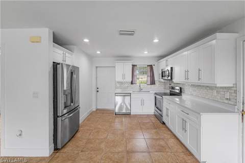 803 Monroe Dr, Lehigh Acres FL - photo 7 of 23