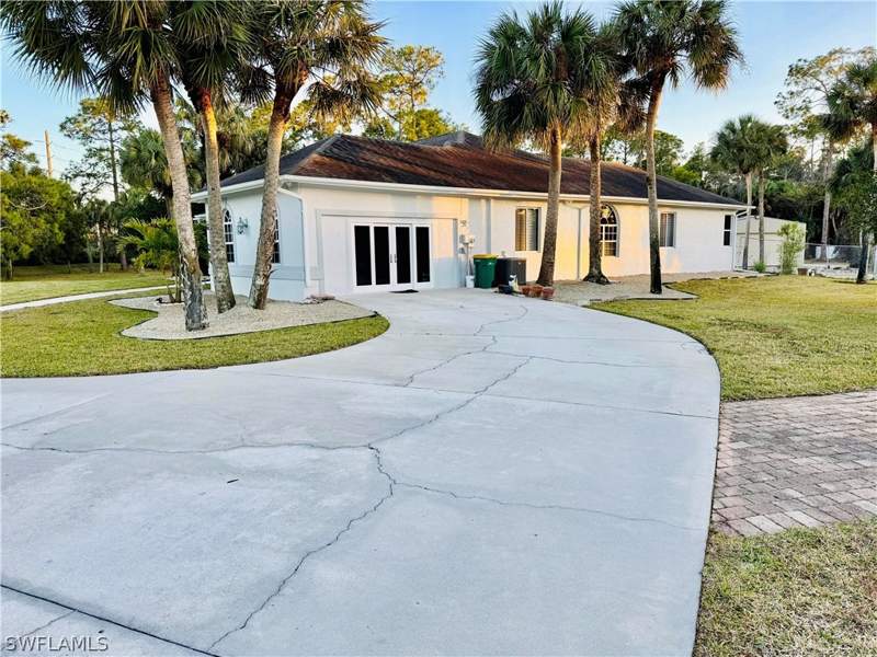 5 bedroom SingleFamilyResidence at 3960 1st Ave NW, Golden Gate Estates, Naples — photo 4