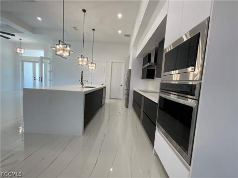 335 SW 31st Pl, Cape Coral FL - photo 11 of 36