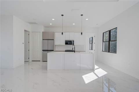 1827 Tomaso Ave, Lehigh Acres FL - photo 7 of 30