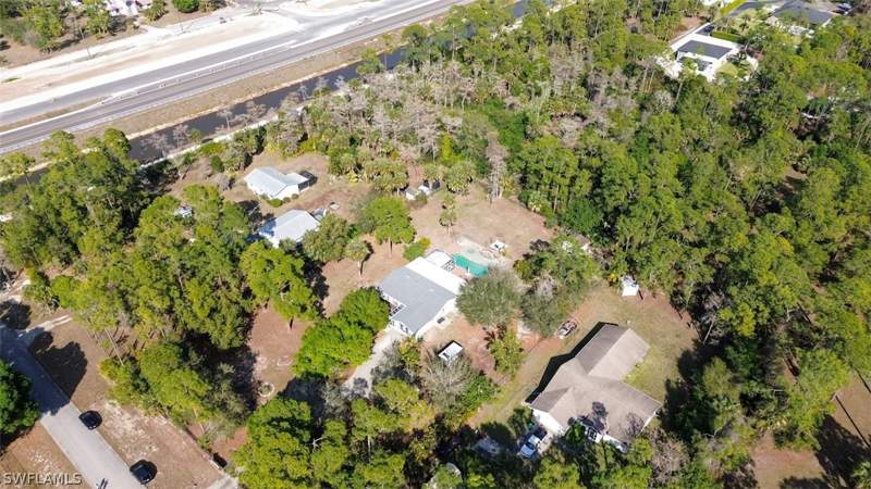 4 bedroom SingleFamilyResidence at 720 29th St NW, Golden Gate Estates, Naples — photo 4