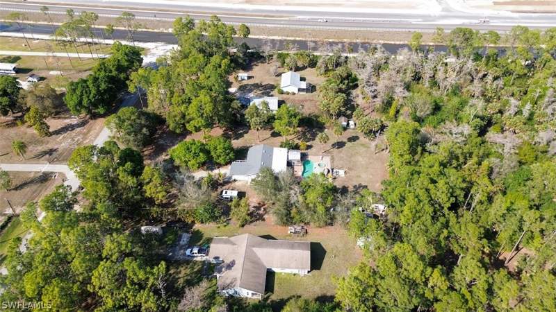 4 bedroom SingleFamilyResidence at 720 29th St NW, Golden Gate Estates, Naples — photo 5