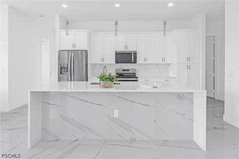 3718 8th St SW, Lehigh Acres FL - photo 9 of 44