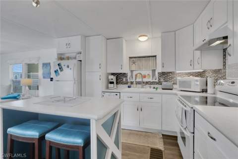 143 Moorhead Mnr 143, Naples FL - photo 6 of 35