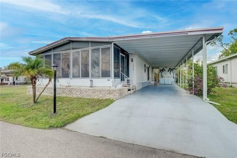 2 bedroom ManufacturedHome at 14597 Paul Revere Loop, Old Bridge Village, North Fort Myers — photo 2