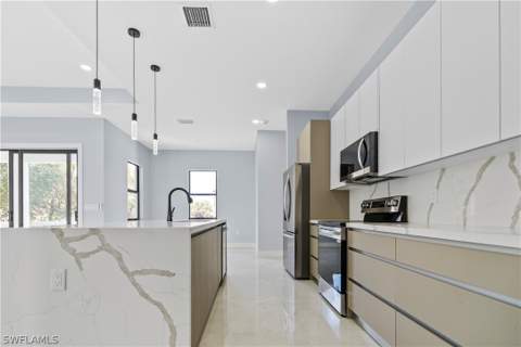 912 Bell Blvd S, Lehigh Acres FL - photo 8 of 24