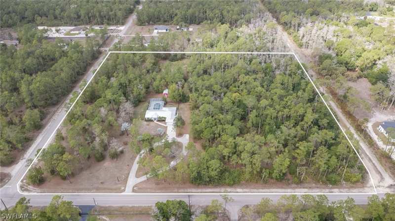 4 bedroom SingleFamilyResidence at 825 Desoto Blvd N, Golden Gate Estates, Naples — photo 1