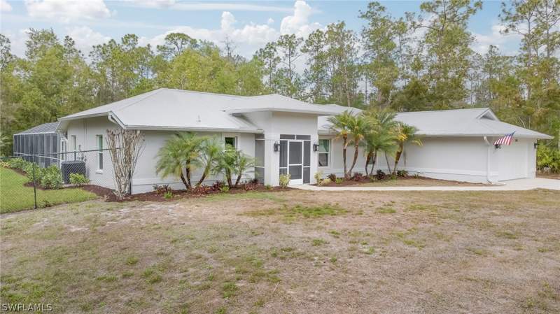 4 bedroom SingleFamilyResidence at 825 Desoto Blvd N, Golden Gate Estates, Naples — photo 2
