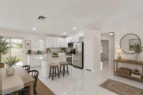 530 Peerless Cir, Lehigh Acres FL - photo 7 of 48